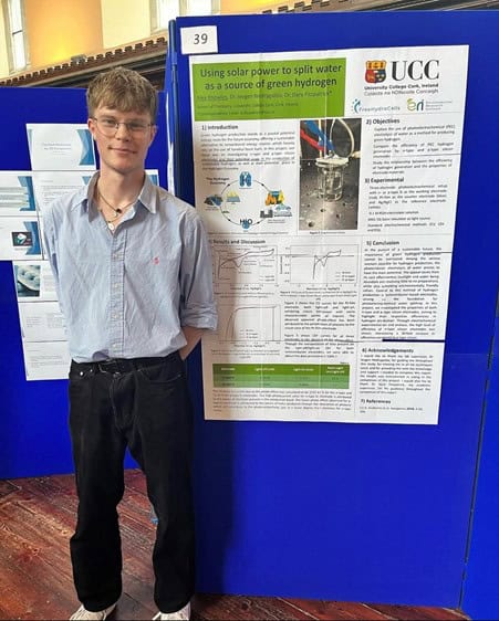 Alex at his poster presentation for his final year project