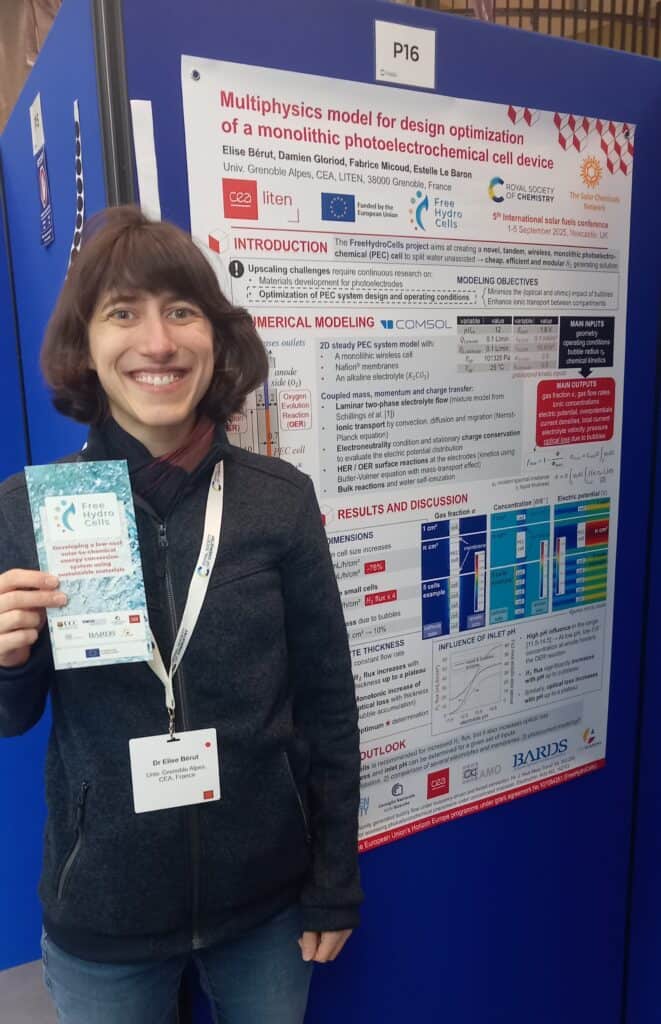 Elise Berut in fornt of her poster at the ISF5