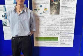 Alex at his poster presentation for his final year project